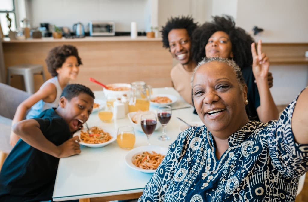 Home health aide supporting a person with memory loss at home in NYC