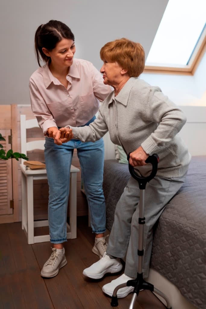 Home health aide providing mobility and fall prevention support in New York City