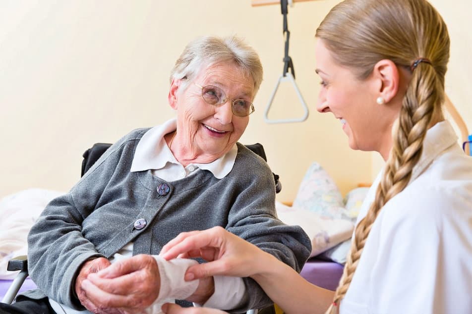 Caregiver assisting a client at home